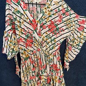 Womens floral, flouncy romper. Size medium
